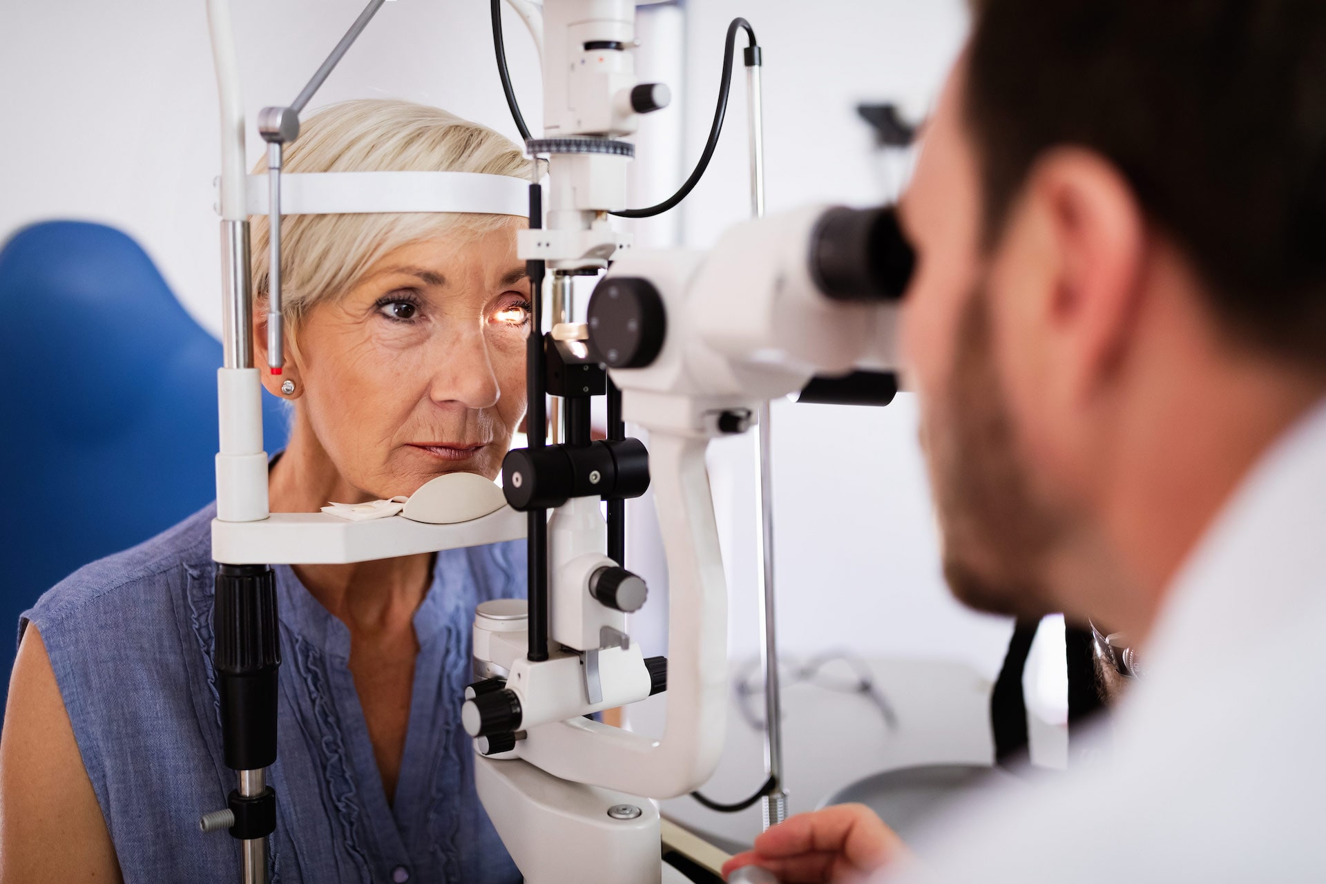 doctor examining a patient's eyes
